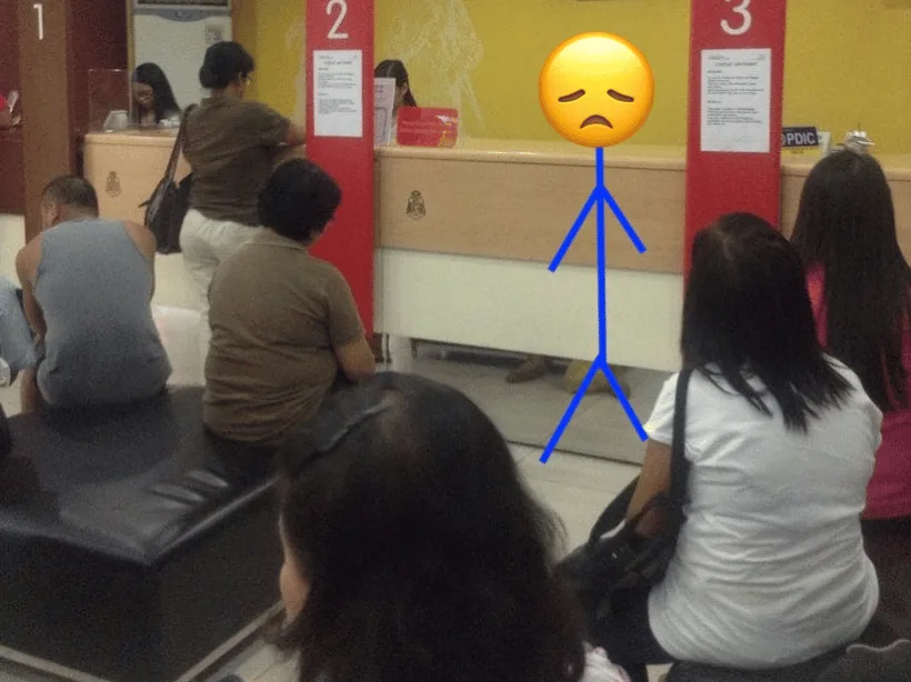 Customers lining up at a bank branch
